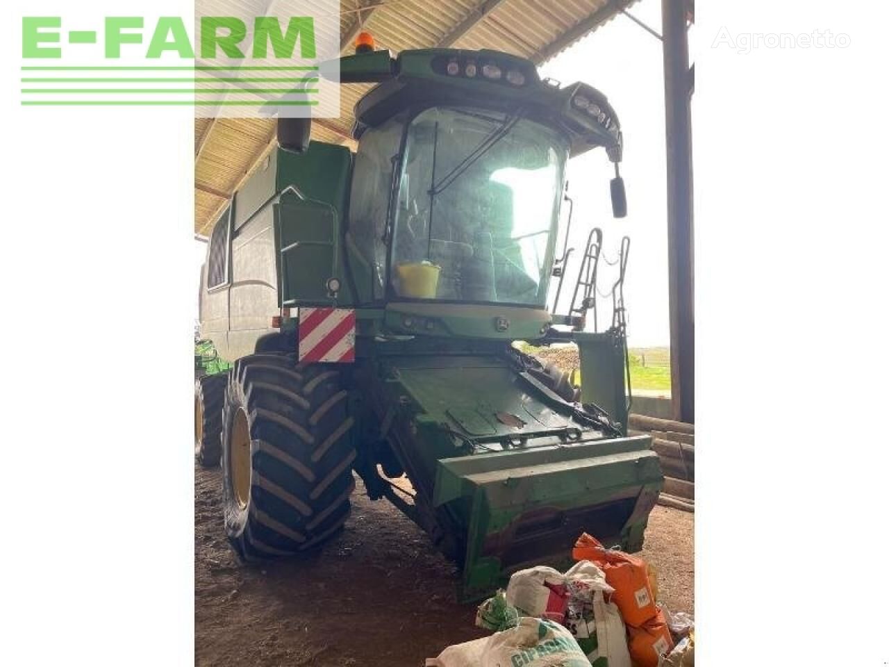 John Deere t550 grain harvester